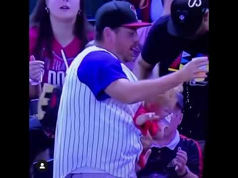 Hero or Bad Dad? A Man Catches a Foul Ball Without Dropping His Baby or Spilling His Beer