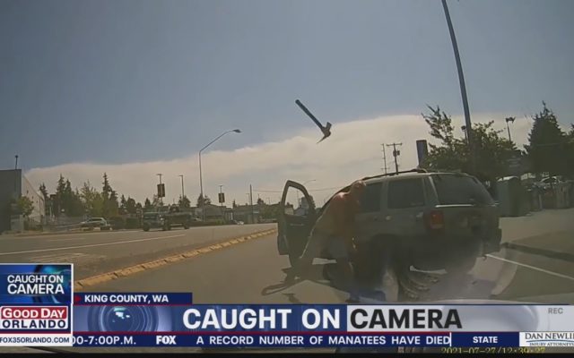 Guy Throws Axe Through Windshield In Road Rage Incident